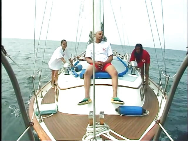 Couple of nice ebony babes are doing one cock on the deck of sailing ship