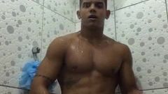 Latino showers and shows off
