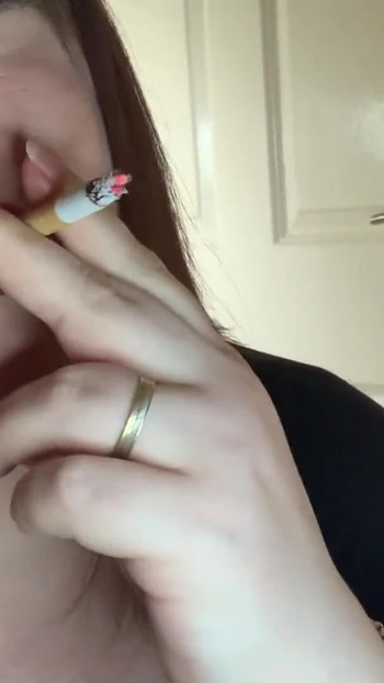 Spectacular moment from "Mistress Tina Smokes A Cigarette With Snap Inhales - Fetish"
