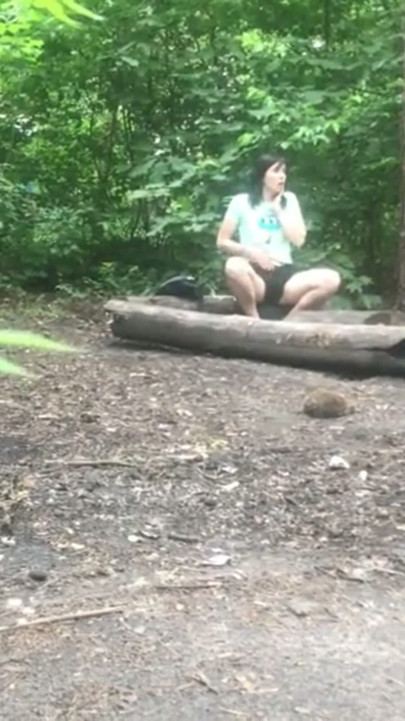 She’s pleasuring her pussy  a sweet brunette MILF in the forest, and I’m secretly watching her! | Clip 1