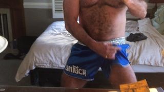 JO in blue trunks