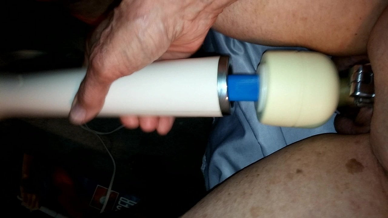 Cock milking while caged