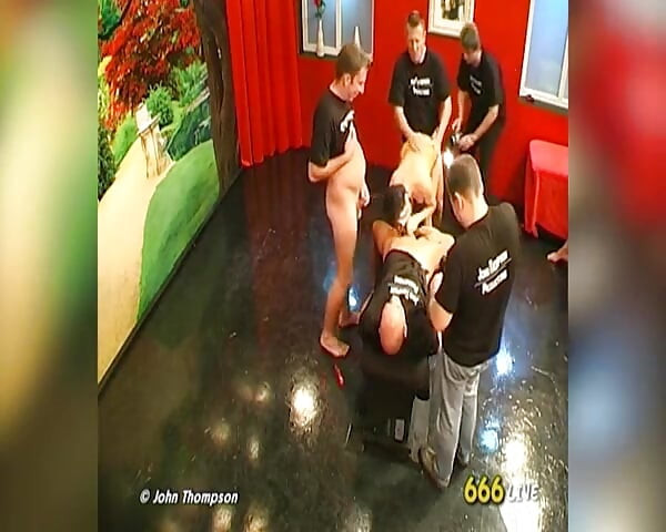 Brunette Slut Drenched in Piss by Multiple Men