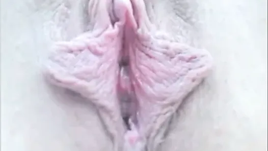 Rubbing her big clitoris