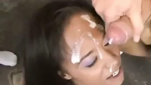Thick load on mixed lady's forehead