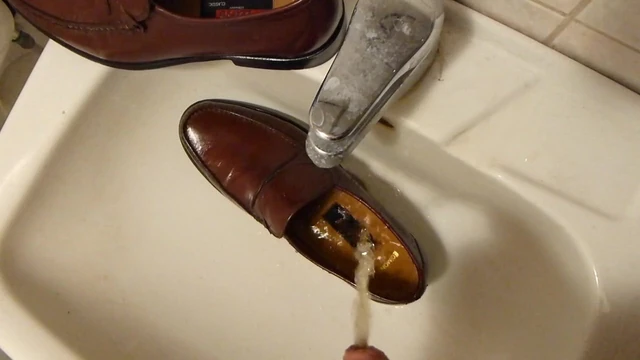 Piss in men's dress shoe