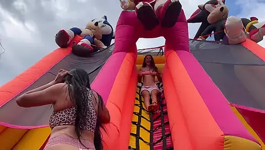 Horny lesbians fucking in a bouncy castle