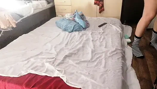 Sexy brunette doing naked chores around the house.