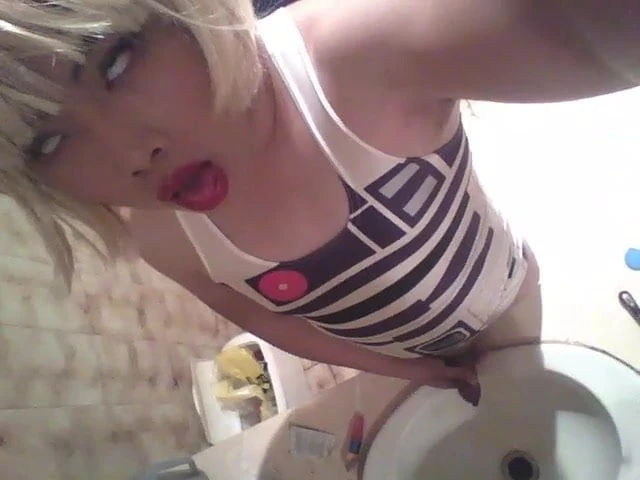 Blonde Sissy Starts Pissing