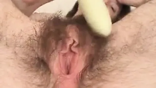 Very hairy babe toys her pussy