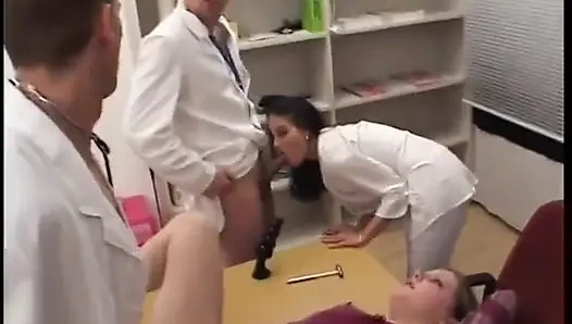 Blonde teen sucking dicks and getting fucked in orgy at doctor's office