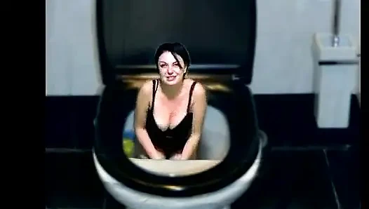 Kate flushing herself to the toilet while dancing part by part of her body