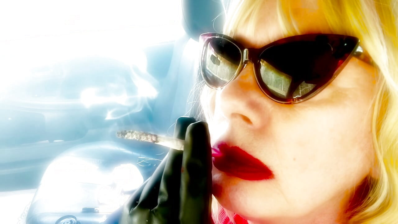 MATURE BLONDE SMOKING VS120 MENTHOLS WITH CAT SUNGLASSES
