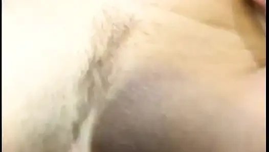 Brunette takes cock in her tight pussy while laying on bed