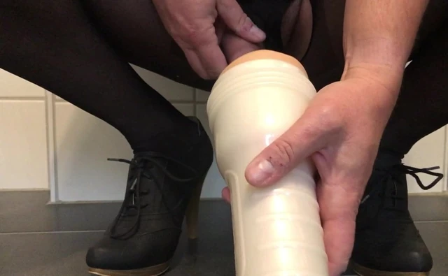 Fleshlight, High Heels and open crotch tights.