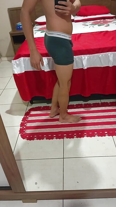Curiosity A shy woman alone, affectionately playing with her private parts at home.