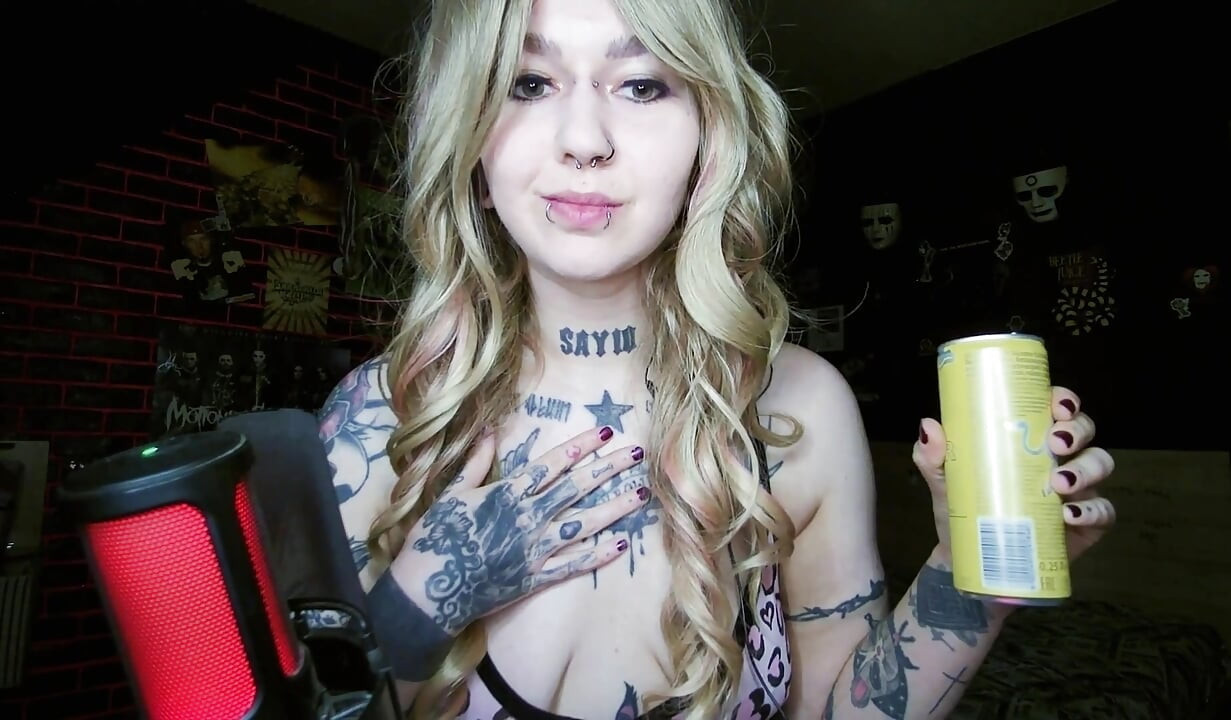 Alternative blonde drinking and burping