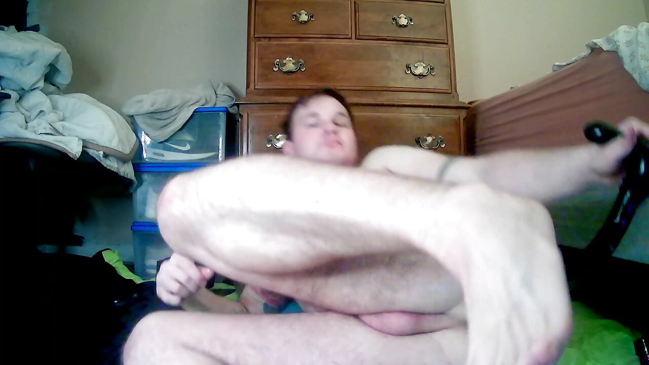Toying with my ass good.