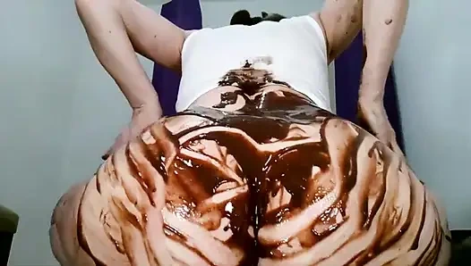 Twerking a big butt spreading chocolate all over Arse
