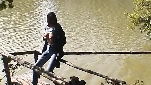 Amateur couple fucking on a blanket by the river