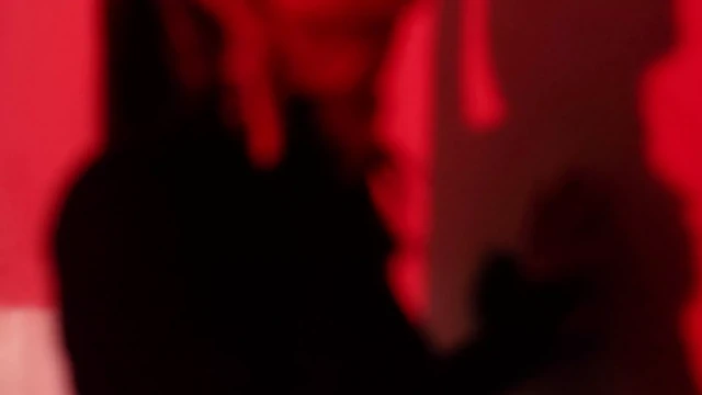 Do you like red? Miss Rhodes in the red light