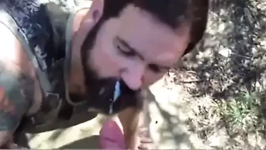Daddy gives a facial in the wood