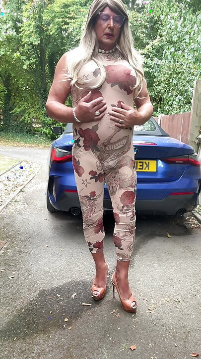 Sexy Crossdresser kellycd2022 in sexy floral see thru catsuit and heels