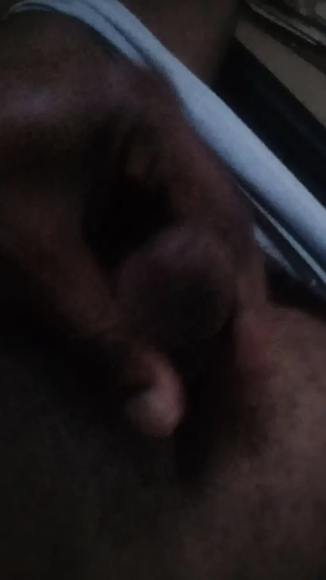 Masturbating