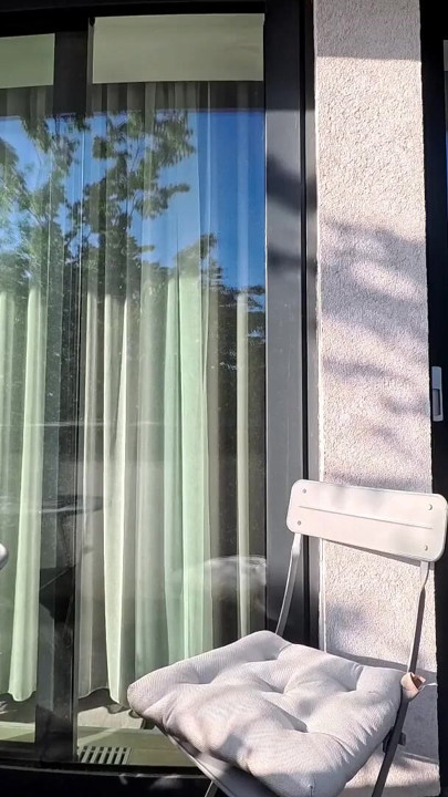 Wonderfully beautiful girl in a summer dress no panties on the balcony shows her tight shaved pussy to the neighbors | Clip 1