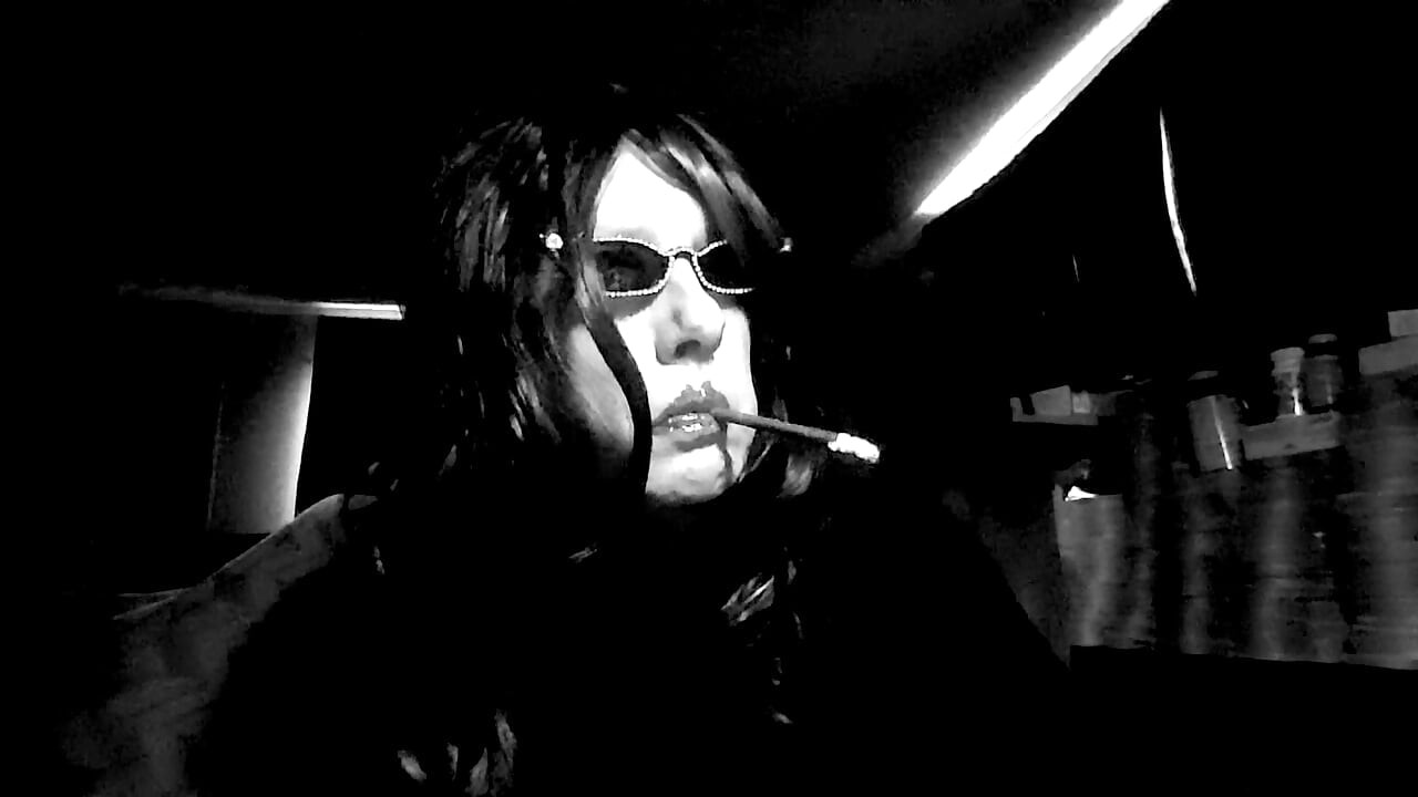 SITTING AT MY COMPUTER DESK AND SMOKING MORE120 LONG CIGARETTES