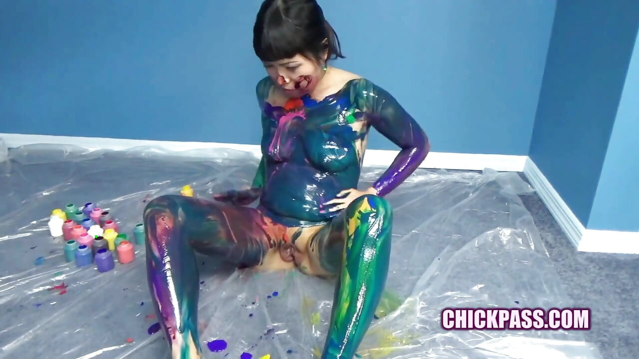 Asian cutie Yuka plays with paint