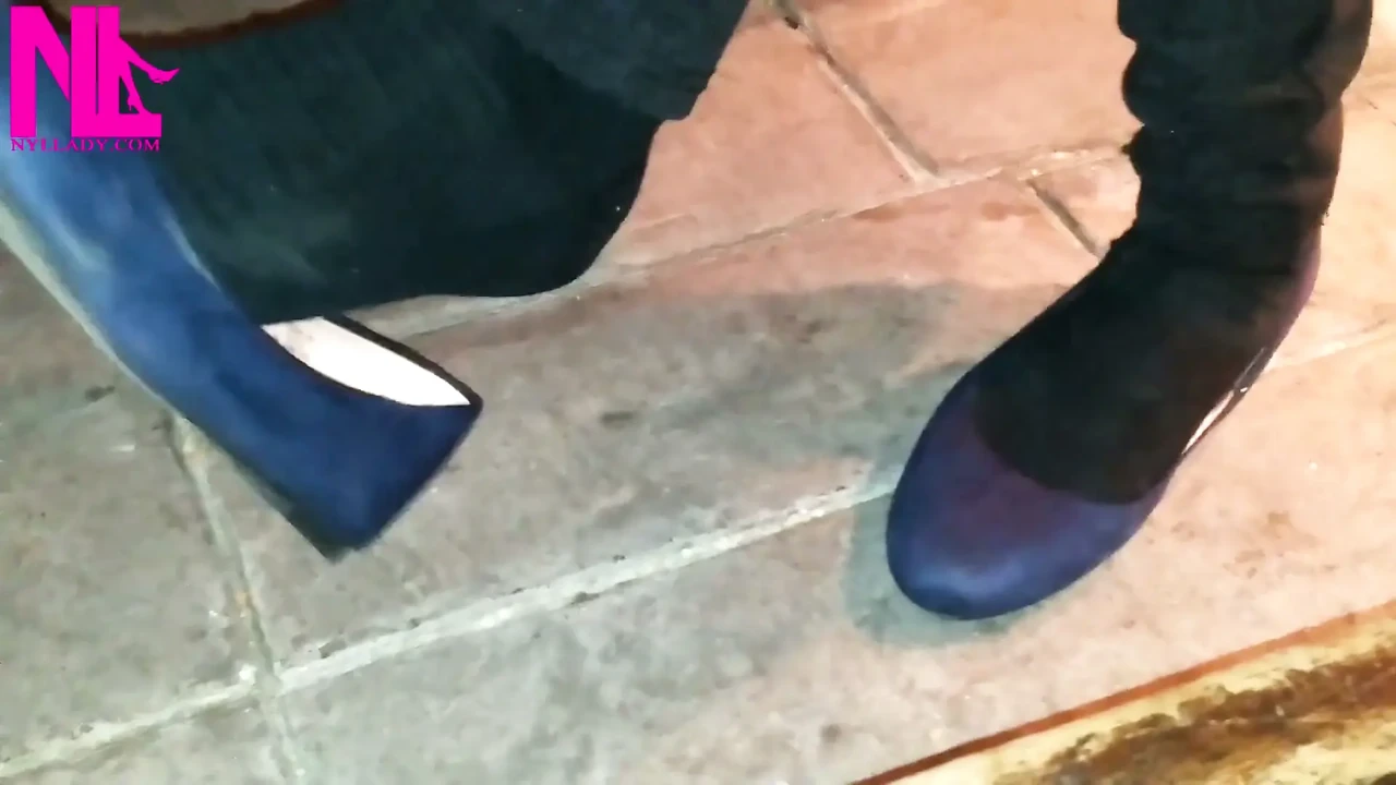 Dangling in Blue Ballet Flats in a Bar