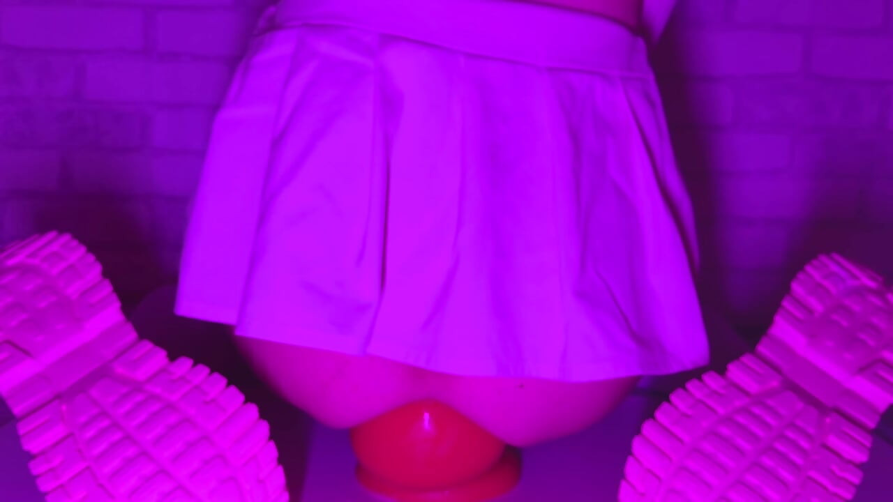 Sissy Girl In Short Skirt Bounces On a Huge 12-centimeter Thick Anal Plug