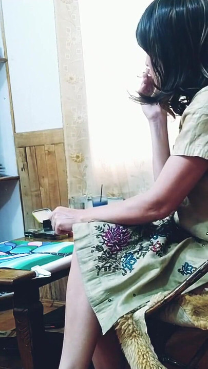 Iconic moment from "Smoking Hot MILF Showing Long Legs Expecting Tips."