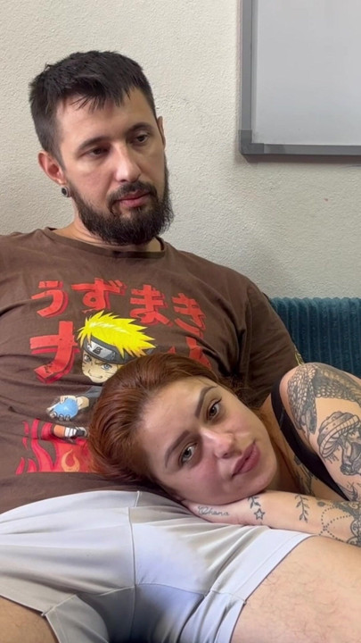 Tattooed Redhead Lies on Her Lap to Watch a Movie and Ends Up Sucking Your Hard Cock