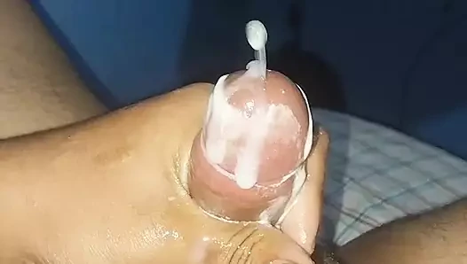 Jerking off my already cum covered dick till I cum again