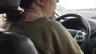 Woman smoking in car