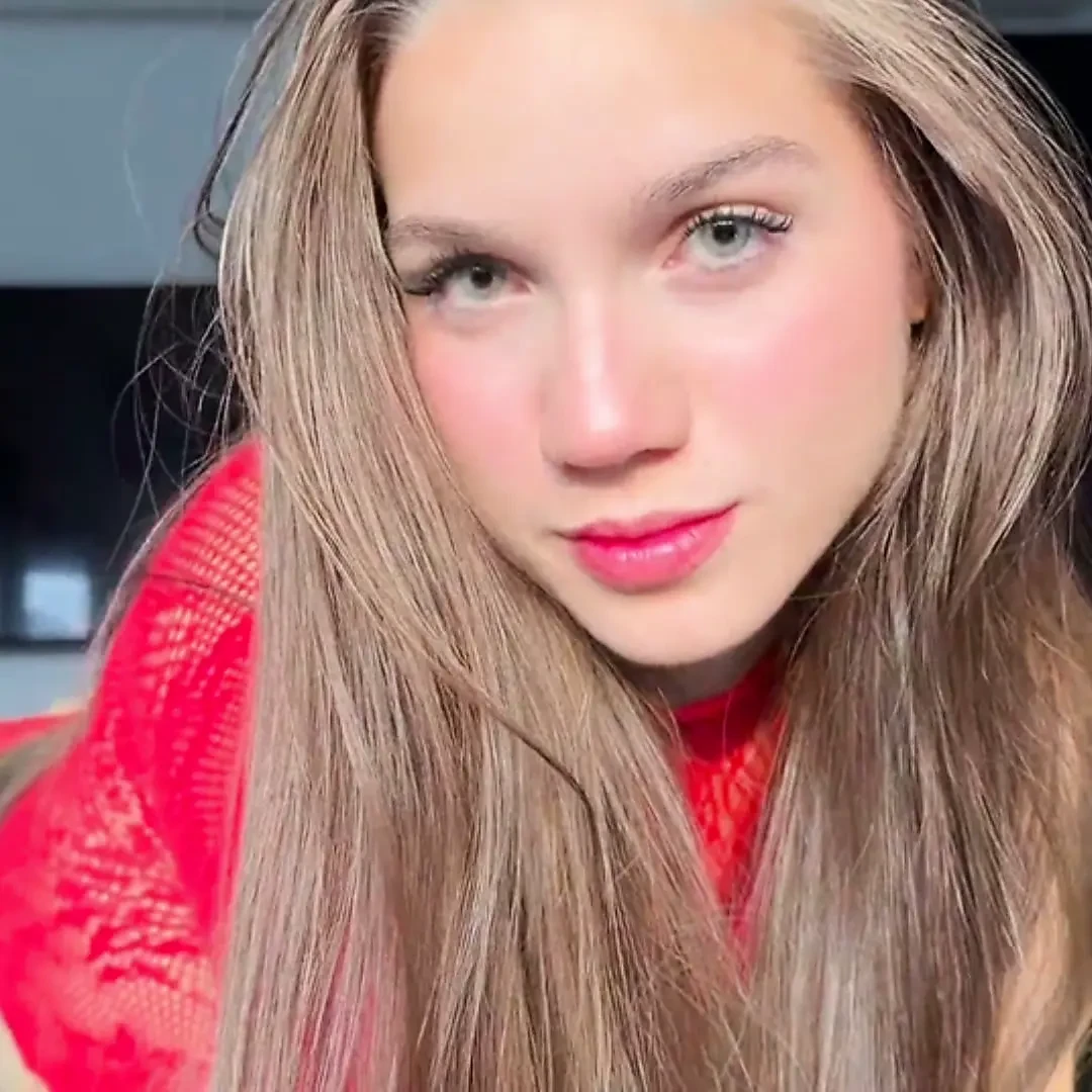 Young model with a perfect ass gets pounded hard while wearing a sexy, passionate red dress.