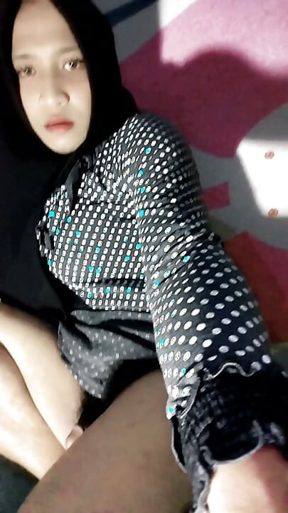A Beautiful Hijab Is Coming Home From Her Wedding Dress