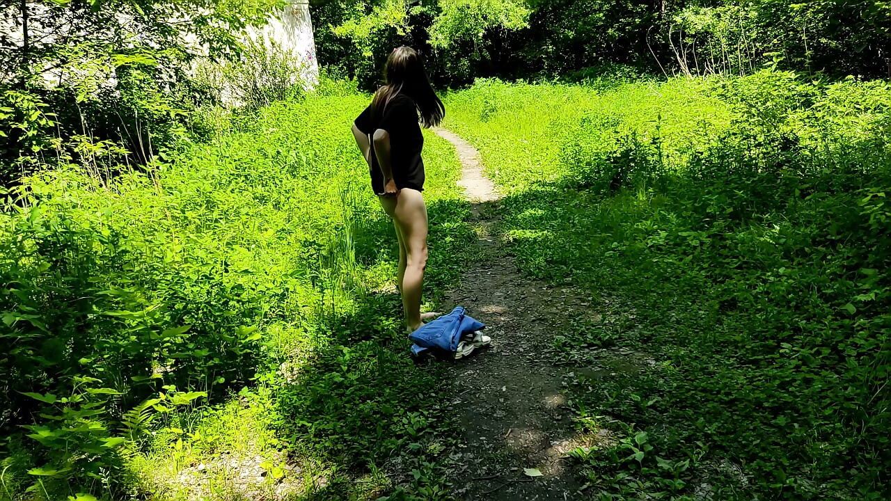 Jogging without pants in a forest park. Old video