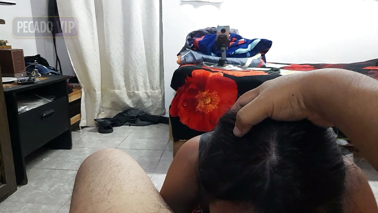 A very sexy schoolgirl gives a very hot deep-throat blowjob while she's home alone