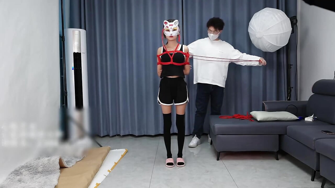 A Young, Beautiful, Slender, and Adorable Girlfriend, with Black Stockings, Red Strings, and Restraints