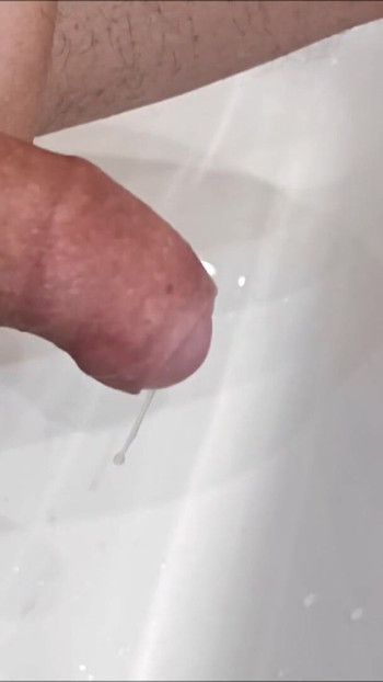 Must-share moment from "Slow motion flooding cumshot, cumming with a ball stretcher"