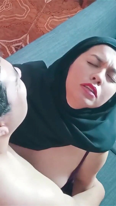 having rough sex with my stepmother while wearing a hijab on the sofa | Clip 1