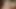 Dark-skinned girl riding huge dildo in her bedroom
