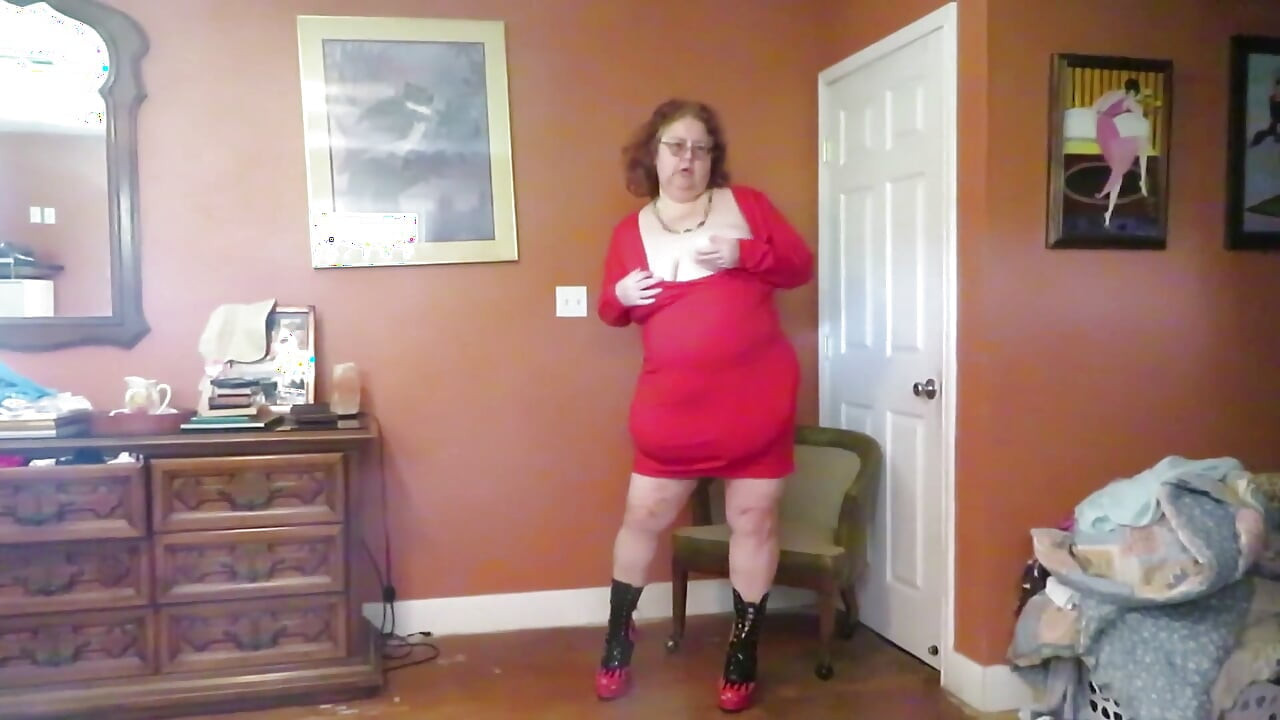 Strip tease from red dress and flaming boots part 1