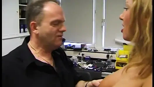 Blonde mature sucking his cock