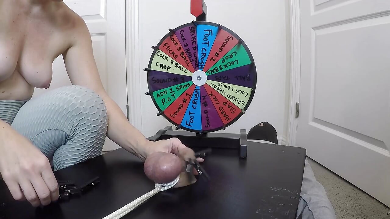 She inserts a 30cm probe all the way into his meaty cock. Playing BDSM roulette.