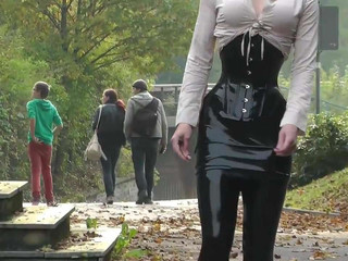 Lady black latex skirt outdoor