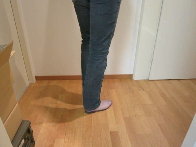 Wear transparent rubber riding boots barefoot and demonstrat